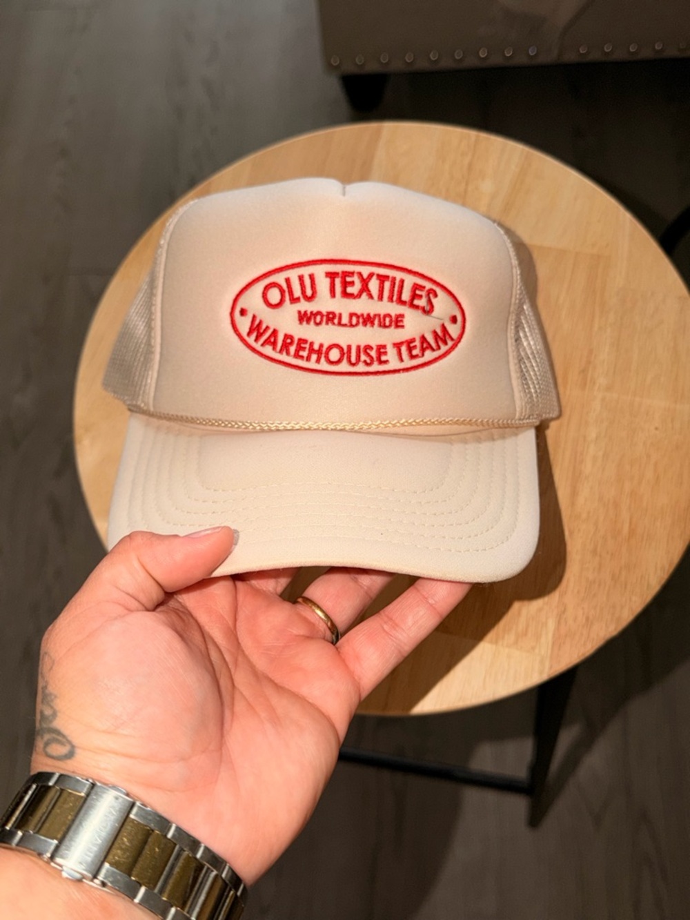 Beige Trucker Hat with Red Embroidered Logo